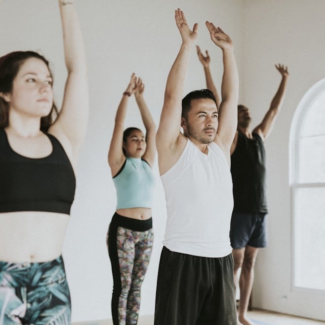 Men and women doing Zumba class